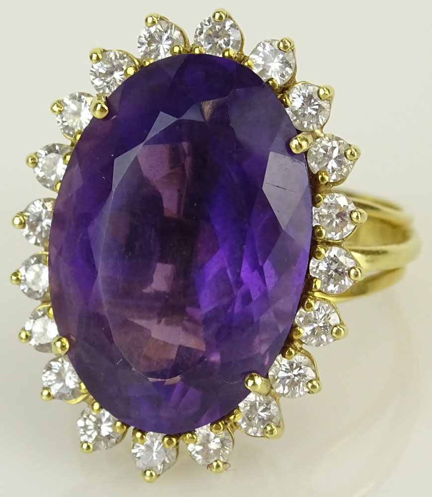 Lady's Amethyst Diamond 14 Karat Yellow Gold Ring-Dant. The large faceted center stone, 15mm x