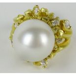 Lady's vintage Morelli signed 16mm South Sea pearl and 18 karat yellow gold ring accented with small