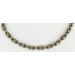 Lady's 18 karat yellow gold, silver and single cut diamond necklace. Unsigned. Good condition.