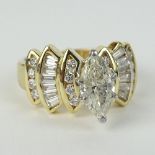 Lady's Approx. 1.08 Carat Marquise Cut Diamond and 14 Karat Yellow Gold Engagement Ring accented