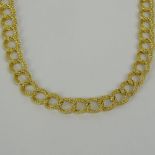 Fine 18 Karat Yellow Florentine Gold Lady's Necklace with Safety Lock. Signed Italy 750. Weighs 15.