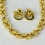 Lady's Ferragamo Gold Tone Metal Necklace and Earrings. Signed. Good condition. Necklace measures 17