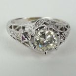 Lady's Art Deco Approx. .88 Carat Round Cut Diamond and 14 Karat White Gold Engagement Ring. Diamond