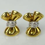 Lady's Vintage Italian 18 Karat Yellow Gold Bow earrings accented with approx. .50 carat small round