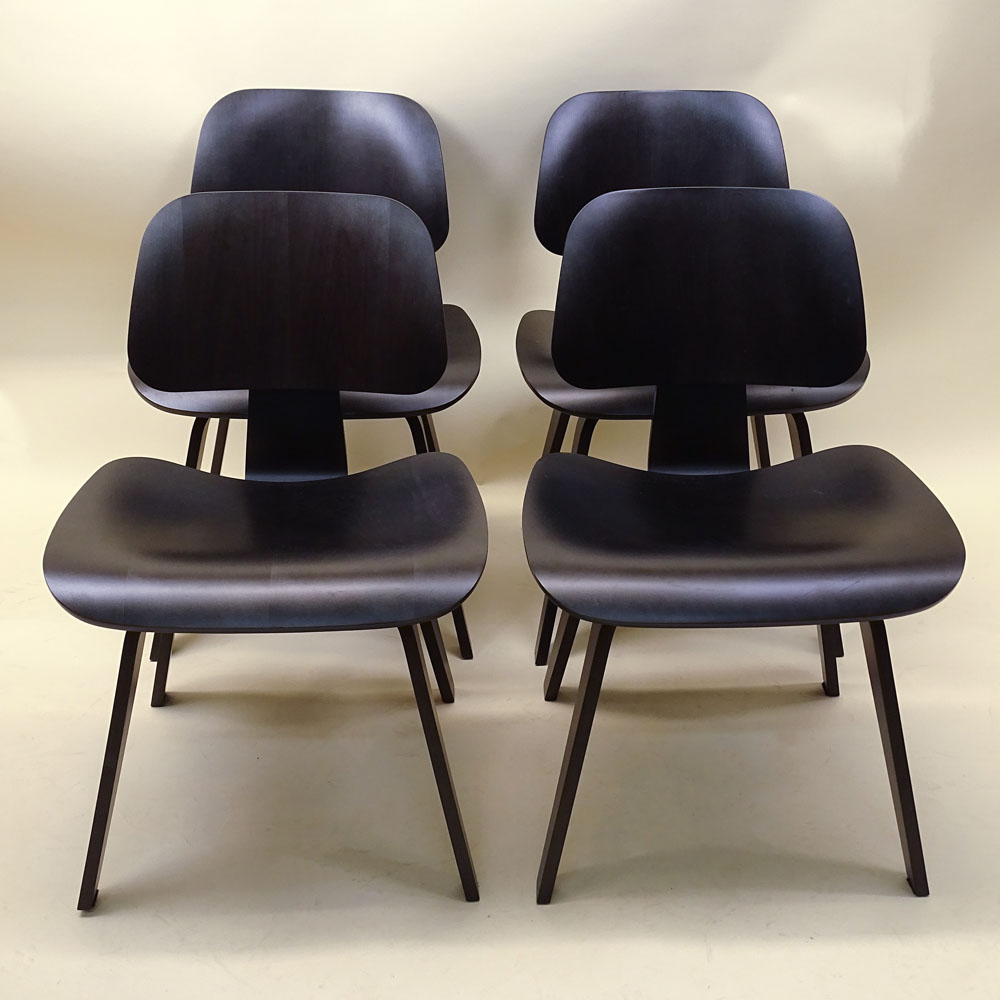 Four (4) Charles Eames Design by Herman Miller Molded Plywood Chairs. Tags to underside. Good