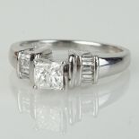 Lady's Approx. .57 Carat Princess Cut Diamond and 14 Karat White Gold Engagement Ring accented