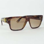 Lady's Versace, Made in Italy Sunglasses. Signed. Minor surface scratches otherwise good