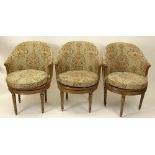 Set of Three French Provincial Style Upholstered Club Chairs. Swivel Feature, Woven Cane Seats under