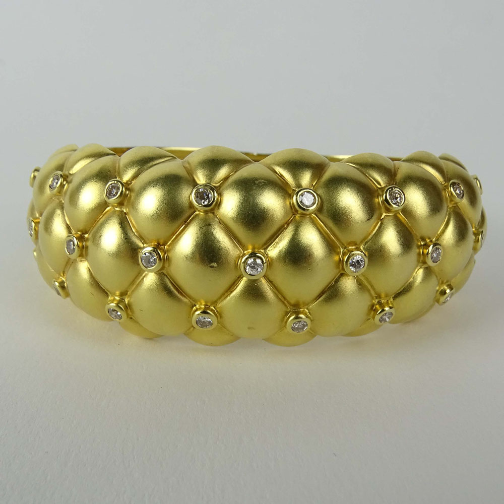 Lady's Vintage 18 Karat Yellow Gold and .79 Carat Diamond Tufted Bangle Bracelet. Signed 750 18K.