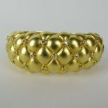 Lady's Vintage 18 Karat Yellow Gold and .79 Carat Diamond Tufted Bangle Bracelet. Signed 750 18K.