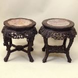 Antique Chinese Carved Hardwood Marble Top Pedestal Tables. Unsigned. Good condition. Measures 19-