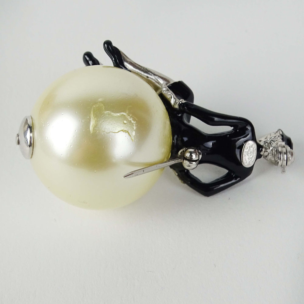 Chanel, Made in France Faux Pearl Brooch with an Enameled Seated Coco Chanel Figure. Signed. Surface - Image 2 of 3
