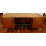 Circa 1968 Large desk by Florence Knoll in Rio Rosewood and Chromed Metal. Unsigned. "As Found"