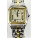 Lady's vintage Cartier 18 karat yellow gold and stainless steel two tone Panthere watch with