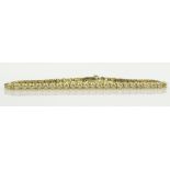 Lady's Diamond and 14 Karat Yellow Gold Tennis Bracelet. Diamonds G-H Color, VS Clarity. Unsigned.