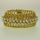 Lady's Vintage Heavy 14 Karat Yellow Gold and Pearl Bracelet. Unsigned. Very good condition.