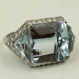Lady's Vintage Aquamarine and Platinum Ring accented with small round cut diamonds. Center