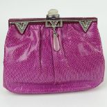 Judith Leiber Snakeskin Clutch with 'Jeweled' Clasp. Signed. Good condition. Measures 6 inches