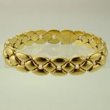 Circa 1992 Cartier 18 Karat Yellow Gold Margot Bracelet with Cartier Box. Signed and Numbered