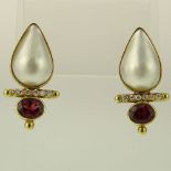 Lady's Mabe Pearl, Oval Cut Garnet, Round Cut Diamond and 14 Karat Yellow Gold Earrings. Signed 14K.