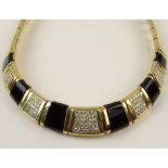 Lady's Vintage Approx. 3.50 Carat Round Cut Diamond. Onyx and 18 Karat Yellow Gold Necklace.