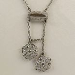 Lady's Approx. 2.50 Carat Round Cut Diamond and 18 Karat White Gold Pendant Necklace with Two