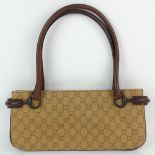 Nice Pre-Owned Gucci Monogramed Long Purse with Fabric and leather. Signed Gucci Made In Italy