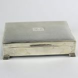 Circa 1960 English E. Viners Sterling Silver Cigarette Box with Wood Liner. Monogram (RA) to top.