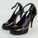 Gucci Women's Metallic Platform Pumps. Pre-Owned. Metallic antique bronze Gucci glazed leather