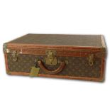 Louis Vuitton Hardside Luggage Suitcase With Interior Tray. Circa 1940s. Signature monogram and