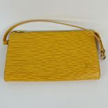 Nice Pre-Owned Louis Vuitton Yellow Leather Wristlet clutch handbag. Monogramed gold tone