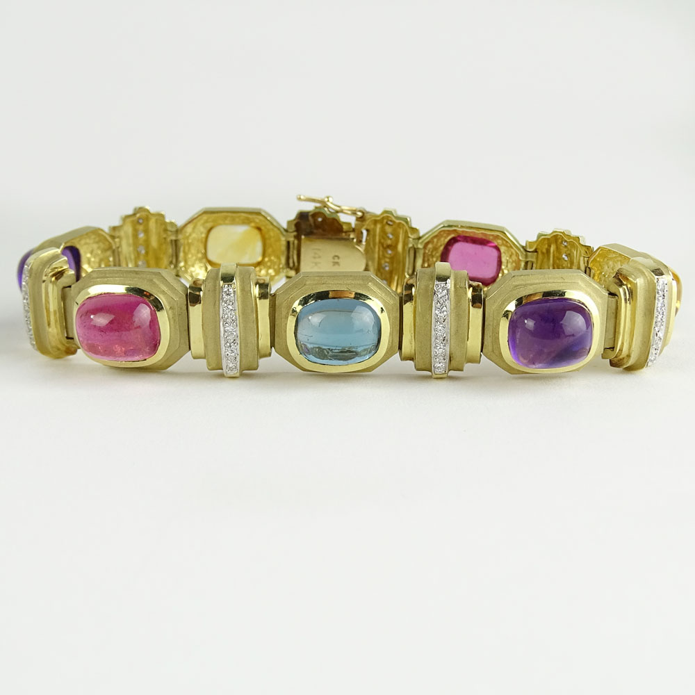 Lady's Vintage Seven Cabochon Tourmaline and Amethyst and 14 Karat Yellow Gold Bracelet accented