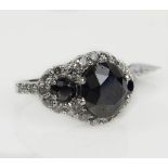 AIG Certified 7.48 Carat Fancy Black Diamond Three Stone Ring Accented Throughout with White