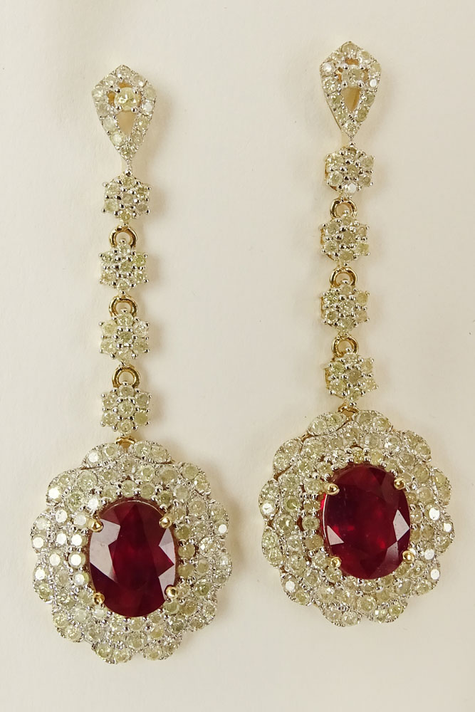 Pair AIG Certified 5.62 Carat Ruby, 3.13 Carat Diamond, 14 Karat Yellow Gold Dangle Earrings. The