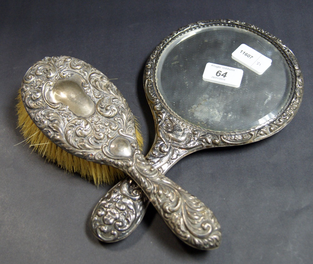 Hallmarked silver-backed brush and hand