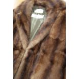 Ladies' 3/4 fur coat, retailed by Arnold