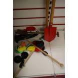 A selection of children's garden tools,