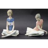 Two Lladró figures of seated ballerinas