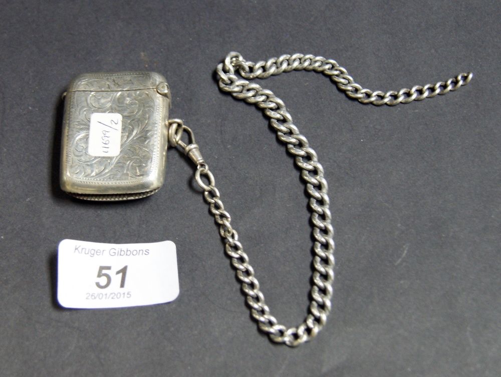 A hallmarked silver vesta case with hing