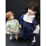 Two large vintage ceramic dolls