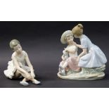 A Nao group figure of two girls in conve