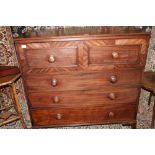 Mahogany secretaire with fitted desk drawer above three other drawers, raised on bracket feet