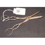 A set of hallmarked silver grape scissors with chased and relief detail