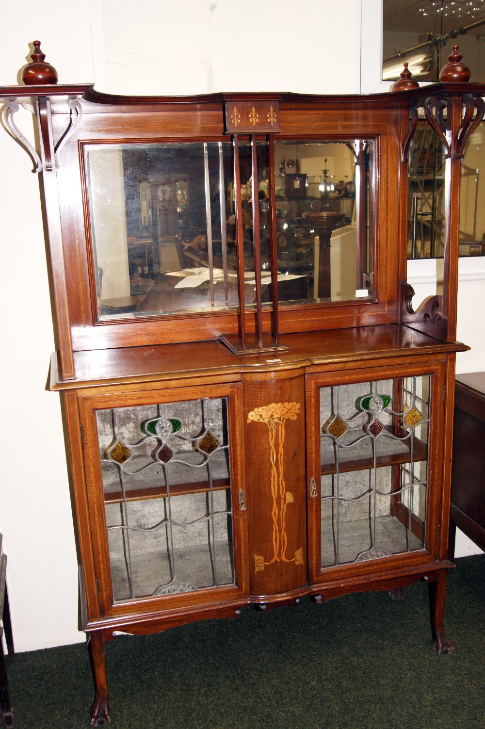 Mahogany Art Nouveau cabinet with naturalistic floral design - two leaded glazed doors with coloured