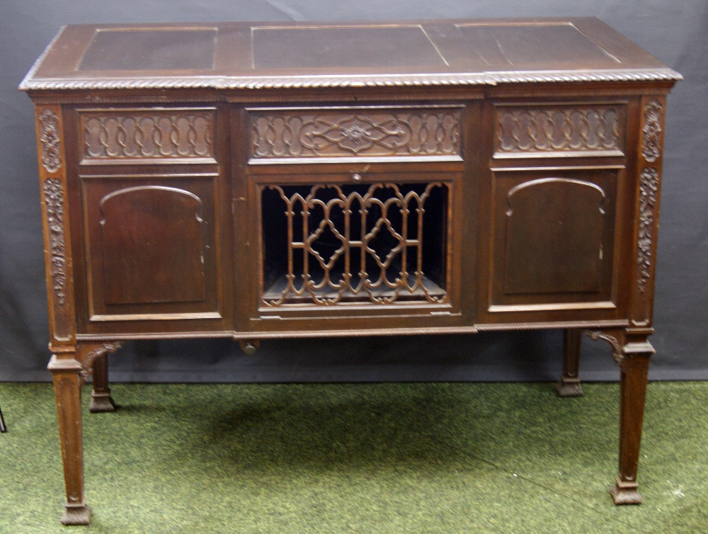 James Smith and Son for Aeolian Hall, a fine-cased gramophone in a neo-Gothic mahogany sideboard,