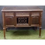 James Smith and Son for Aeolian Hall, a fine-cased gramophone in a neo-Gothic mahogany sideboard,