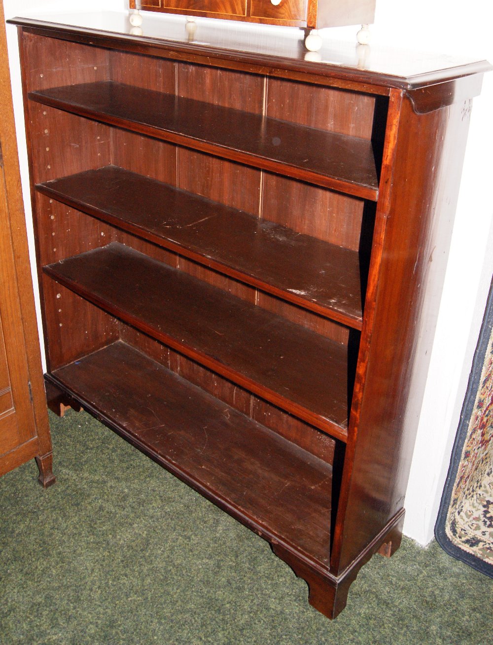 Mahogany open-shelved bookcase