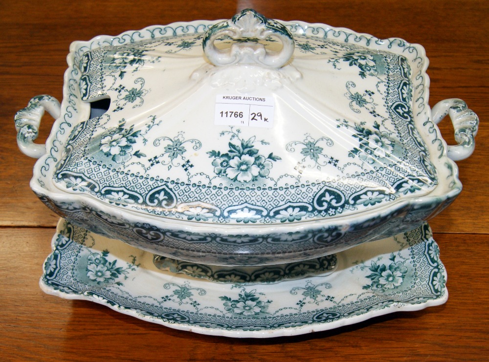 An impressive large ceramic tureen with cover and stand