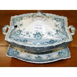 An impressive large ceramic tureen with cover and stand