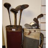 Two vintage golf bags, each containing golf irons and woods, including one by Tom Auchterlonie, St